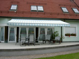 Crossover Arm Awnings