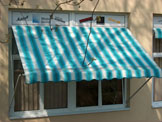 Drop-Arm Awnings